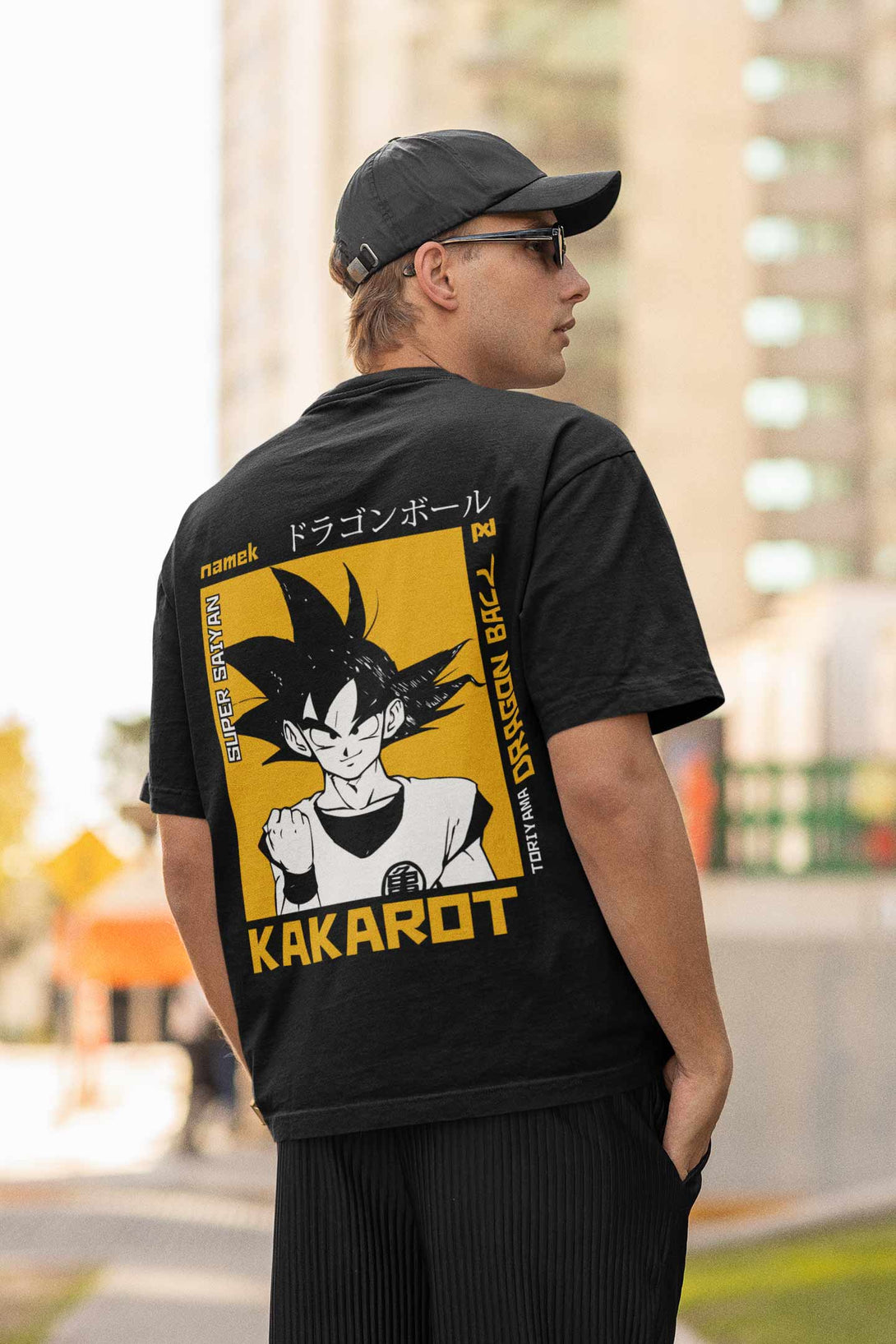 Dragon Ball Anime Printed on back side of black colour oversized t-shirt.