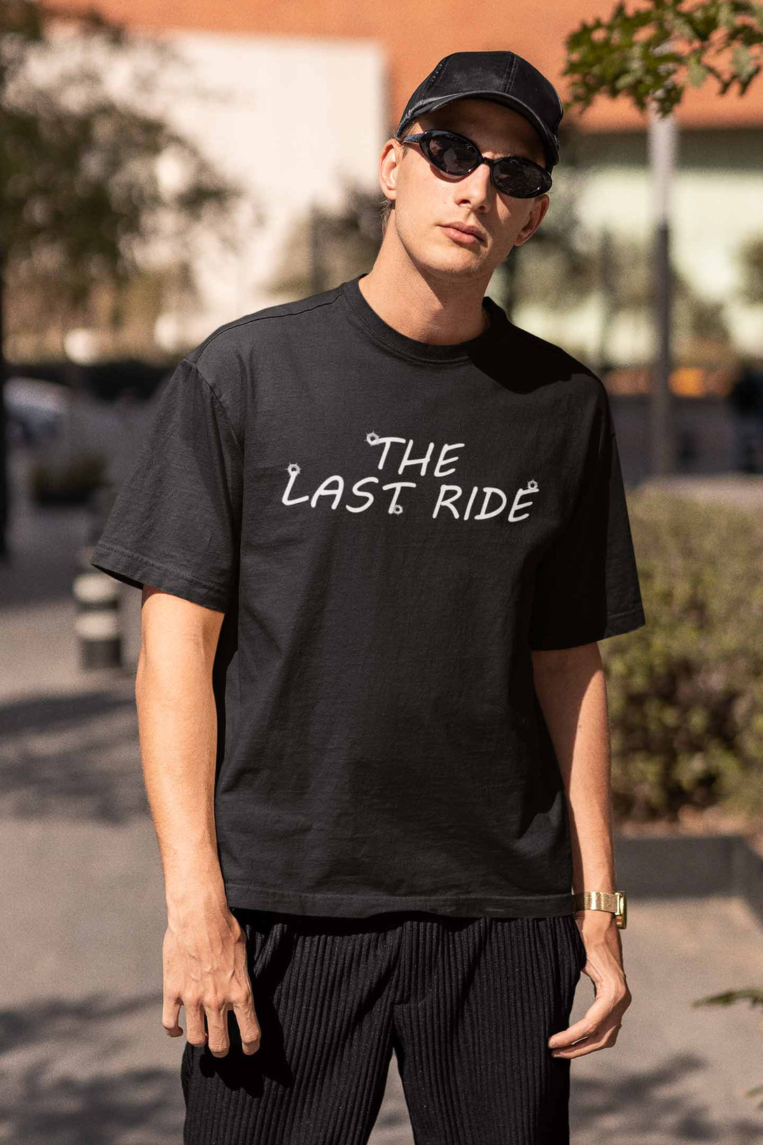 The last ride printed on front of black colour oversized t-shirt