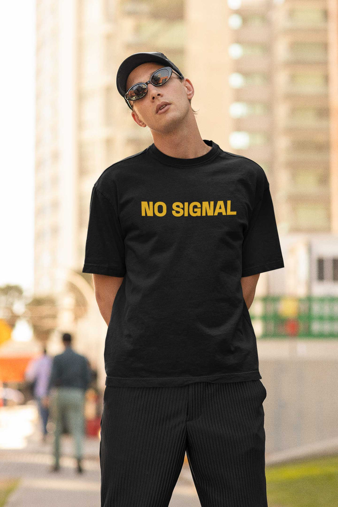 No Signal printed on front of oversized t-shirt.