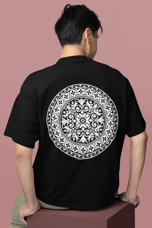 Mandala Art printed on black color oversized T-shirt.