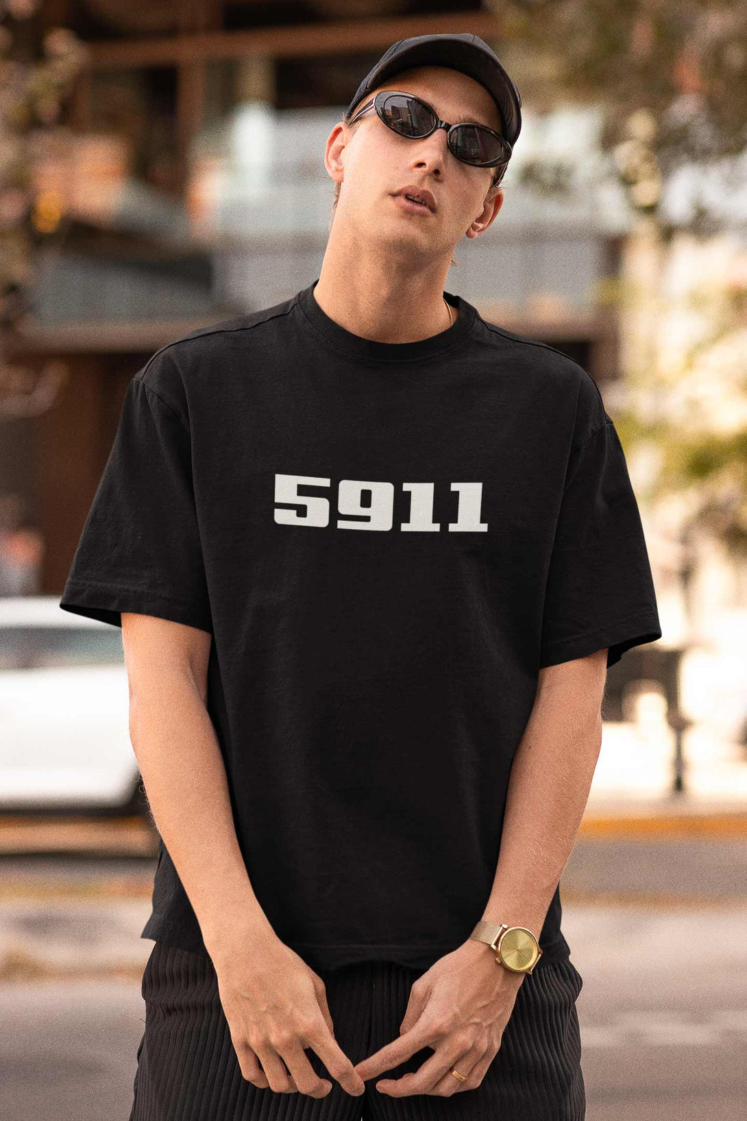 5911 printed on front of black oversized t-shirt